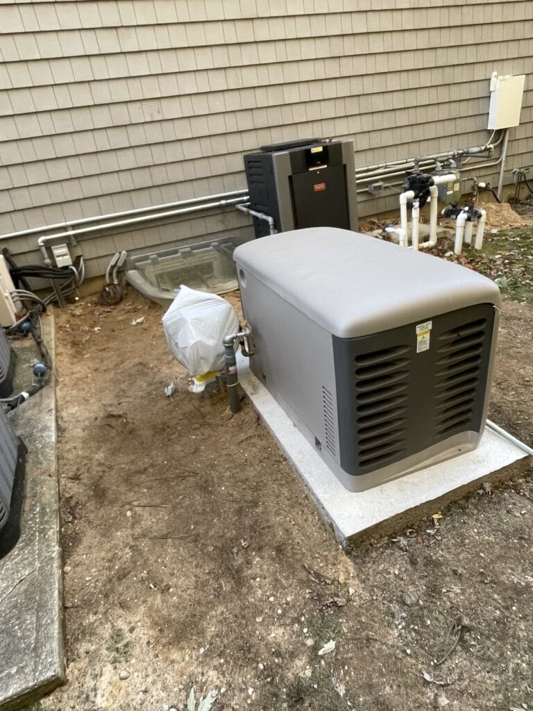 A large standby generator is installed next to a house near Bayonet Point FL